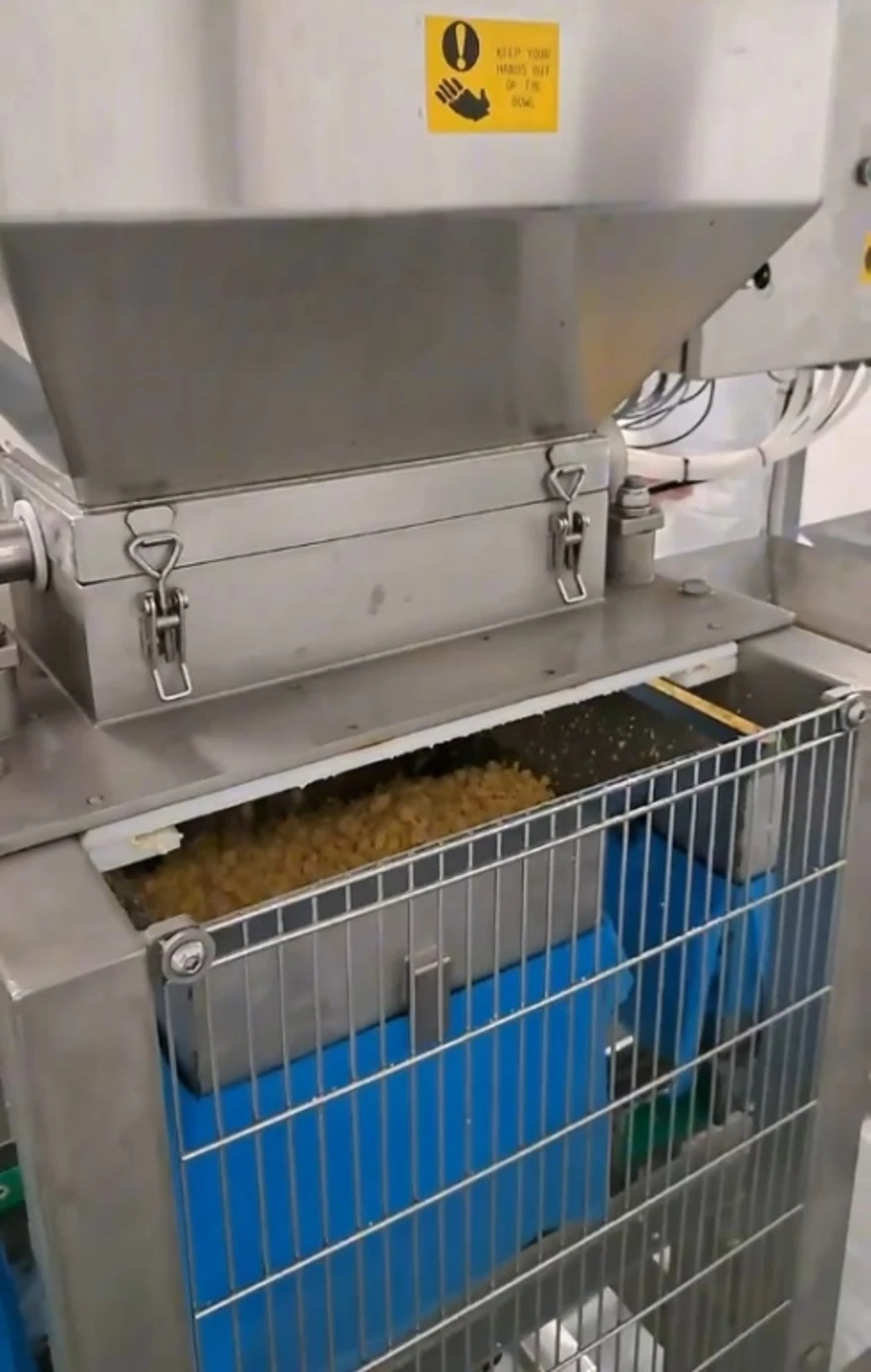 Molino Cheddar — sistema de pre-prensado automático para consolidación de cuajada